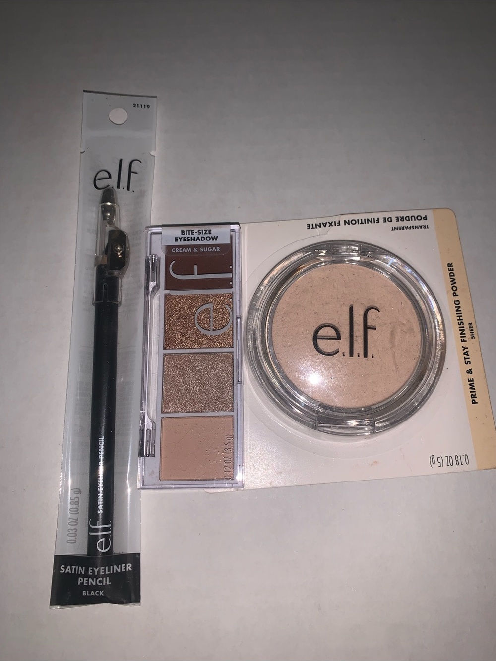 ELF Neutral Eyeshadow quad & Black Satin Eyeliner with Beige Finishing Powder